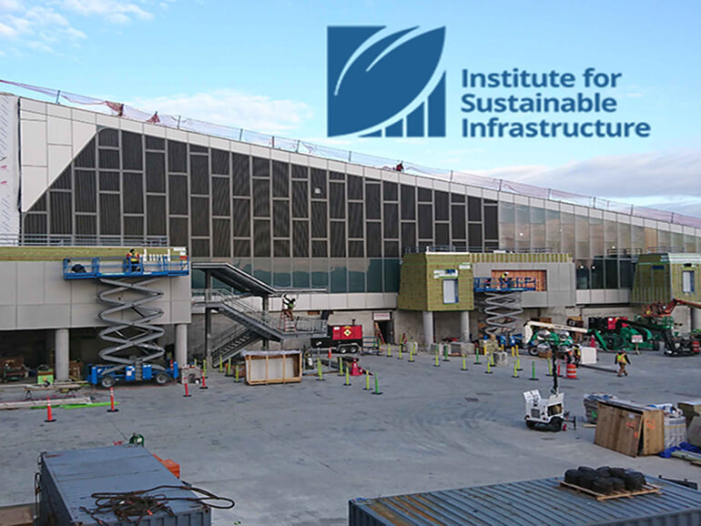 Exterior view of LaGuardia Terminal B and an Institute for Sustainable Infrastructure logo in the upper right