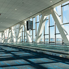 Interior of a pedestrian skybridge at LaGuardia's Terminal B